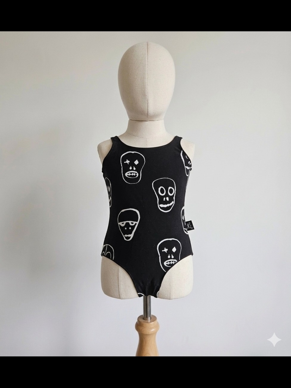 nununu Black One-Piece with White Skull Print- 18/24 Months